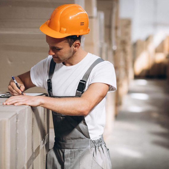 y1oung-man-working-warehouse-with-boxes (4)